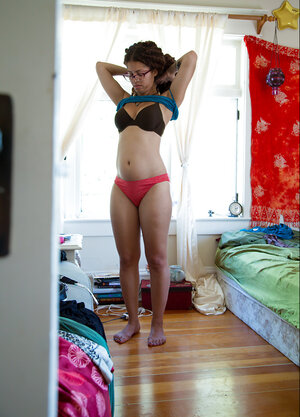 Geeky gal in glbootyes showing her beefy booty and besides teasing also