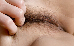 Oriental seductress with a confident gaze is ready to show off