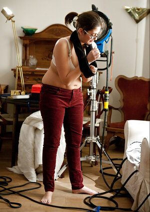 Ariel D is going to show natural bra buddies while correcting clothes