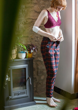 Redheaded hottie puts on her pants and additionally looks extremely, extremely first-class