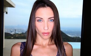 Skinny beauty in awesome blue leotard knows how to pose in provocative way