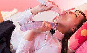 Gorgeous Oriental teenage plays with two dildos before trying a real dick