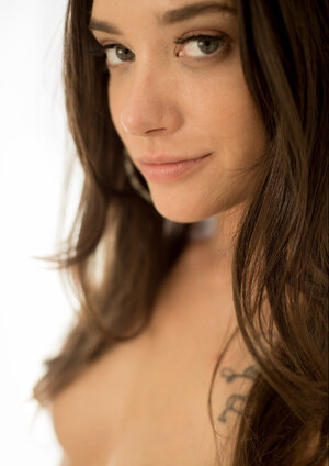 Gia Paige strips and additionally masturbates her trimmed pussy