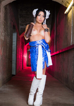 Far eastern Rina Ellis spreads her legs and besides fingers her twat