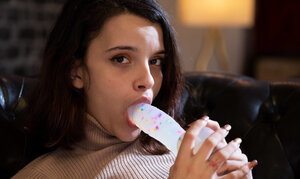 Charming brunette with a shapely tush is going to show off