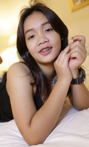 Adorable Thai kitten is going to taste hard foreign dick