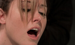 Christina Carter gets pinioned up for hot wax treatment