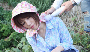 Japanese chick gets pleasured through her pants in rubber boots