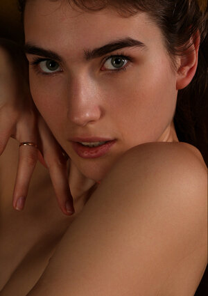 Hot broad with a pretty face and additionally large naturals in an artsy album