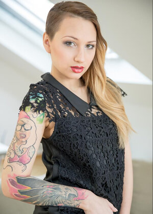 Christie Starr shows her inked-up body before completely all else