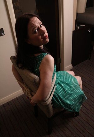 Pervert catches female in green polka dot dress and furthermore ties her to chair