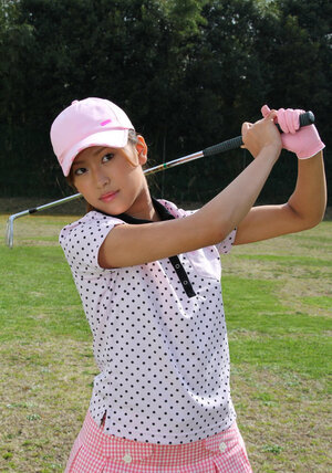 Far eastern golf girl wears shirt and plus besides skirt but dislikes panties and plus besides flashes vagina