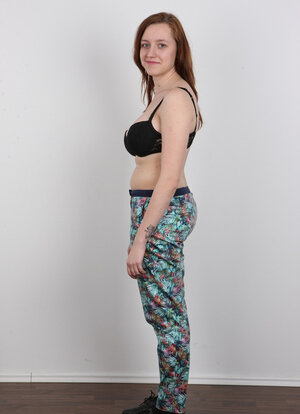 Worship with red hair leaves panties on exposing heavy melons that make her slouch