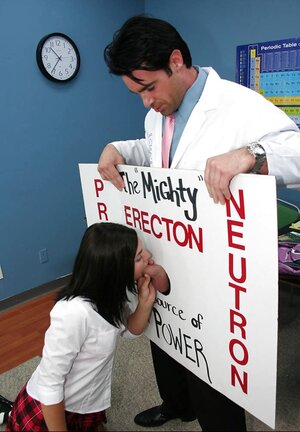 Brunette student gags on teacher's manhood through improvised gloryhole