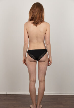 Ginger with tiny jugs deletes clothes but keeps secret something under panties