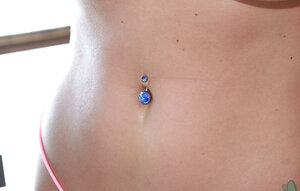 Curvaceous red-haired girl amazes with large breasts and awesome big butt