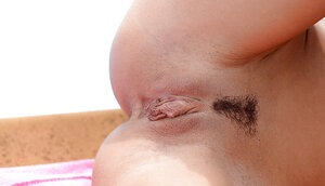 Broad spreads well-groomed twat by the pool & brings fingers into play