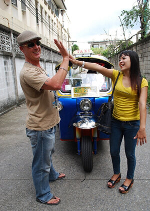 Slutty Eastern girl in yellow T-shirt and moreover jeans finds a dude who pays for posing