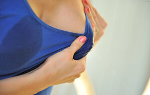 Sexy kitten with nice features loves milking her small boobs wetting the dress