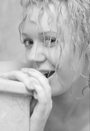 Curly red-haired teeny gets dripping wet in the shower and moreover teases with her sweet tits