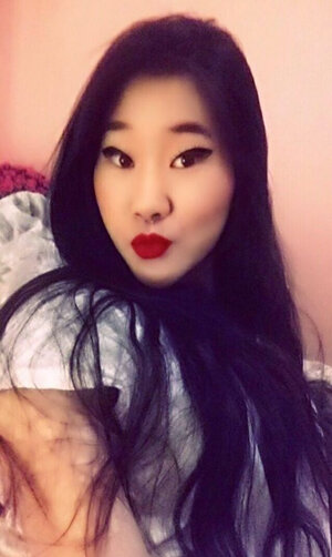 Sinful Spaniard with oriental features rushes to expose herself on verge of adult entertainment