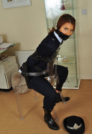 Red-haired dame cop during investigation gets tied up to chair by criminal
