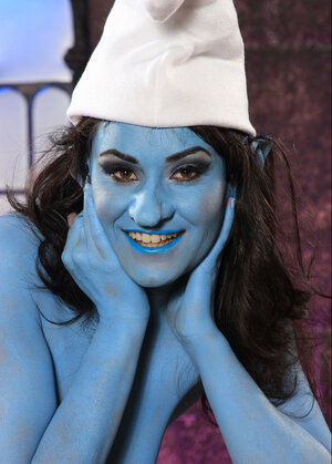 Dripping wet broad dressed like lascivious Smurf exposes her perky boobs and plus pink cunny