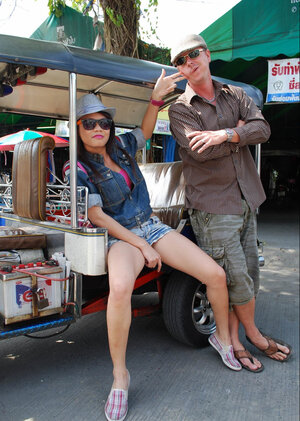 Joyful exotic legal teen agrees to pose with mature dude near auto rickshaw