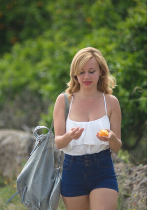 Sweet blonde loves posing outdoors and is ready to find titties