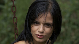 Dark-haired babe from Romania takes element in naked image session outdoors