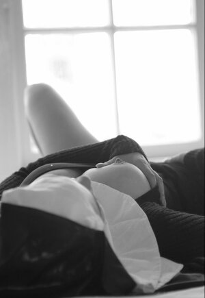 Impudent nun reveals titties while spreading legs to masturbate her cunny