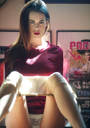 Cute brunette 18-19 y.o. is not shy to slowly undress and plus pose naked