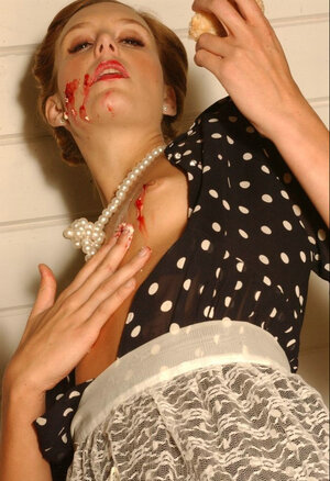 Slutty housewife covers her petite titties in jam while erotically posing