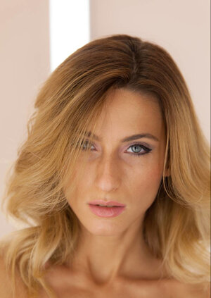 Sensitive blond bimbo in stockings moans with enjoyment from self-satisfaction