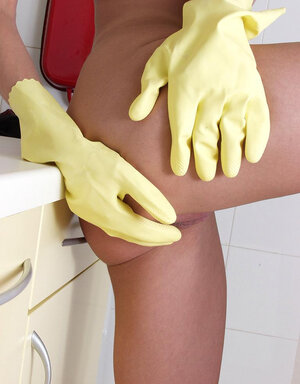 Slender teen puts cleaning aside to pose naked and showcase her young curves