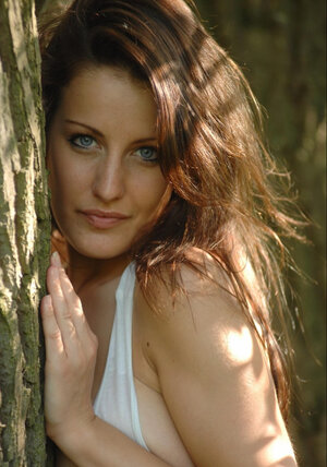 Nice-looking sweetheart makes her shirt drenched before discarding all of her clothes