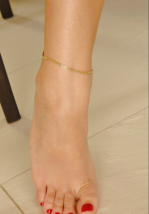 Kinky teenage with awesome legs pulls off clothes to pose wholly undressed