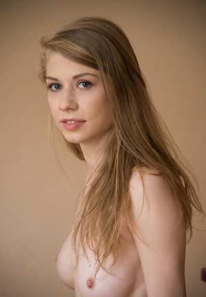 Glamorous blonde Eva Gold takes off her red dress and plus heels