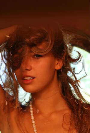 Innocent kitten with an angelic face loves showing you her body